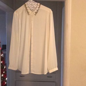 DKNY light weight ivory blouse with glamour.